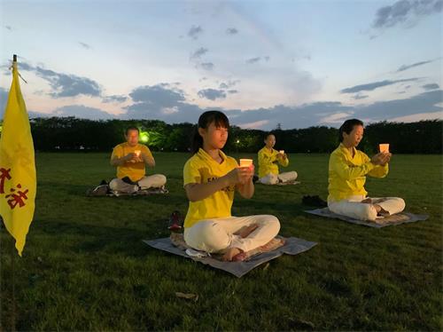'图10：熊谷炼功点学员举行烛光守夜活动'