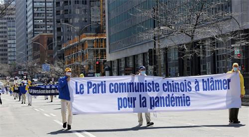'图1～11：加拿大魁北克省部份法轮功学员汇聚蒙特利尔，举行纪念四·二五和平上访二十二周年大游行活动'